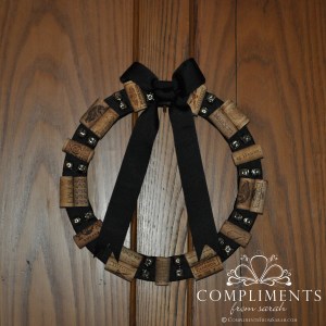 black wine cork wreath with jingle bells